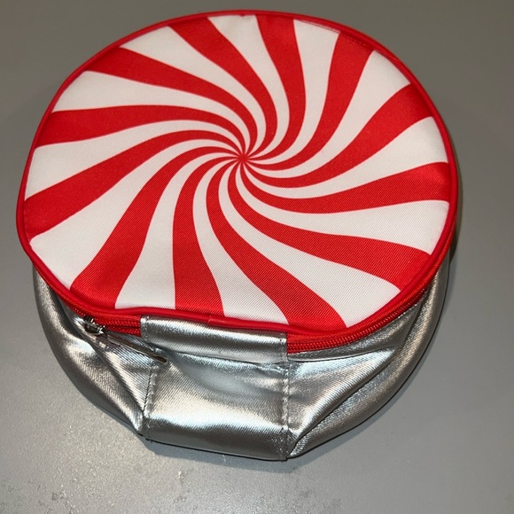 Clinique cosmetic bag designed to resemble the festive starlight peppermint. - Picture 1 of 4